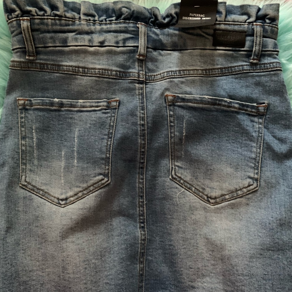 Mini distressed skirt